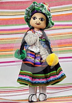 Hand made colored puppet with traditional Peruvian clothes