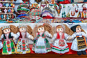 Hand made dolls dressed in romanian traditional folk costumes