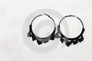 Hand made earing with black wool