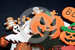 The hand-made eatable gingerbread Halloween pumpkin, ghosts, bat and sceletons