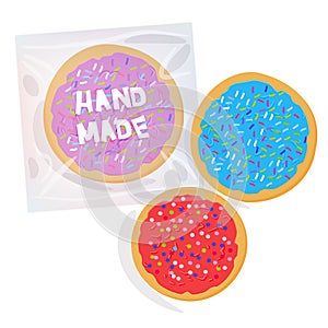 Hand made Frosted sugar cookies, Set Italian Freshly baked cookies in transparent plastic package with pink violet blue frosting