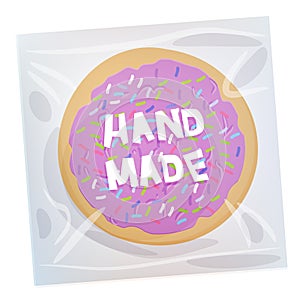 Hand made Frosted sugar Italian Freshly baked cookie in transparent plastic package with violet frosting and colorful sprinkles. B