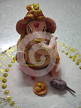 Hand made ganpati ji with mouse and lado photo