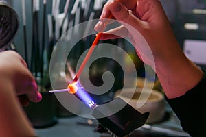 Hand-made glass beadmaking in a glass-blowing workshop