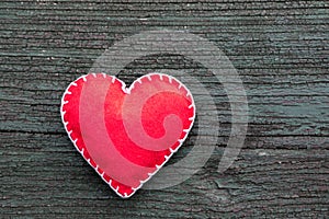 Hand made heart shape, love symbol on wooden background