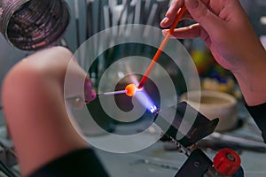 Hand-made lampworking in a glass-blowing workshop
