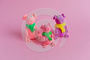 Hand made little plasticine pigs