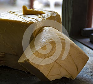 Hand made from natural ingredients and oils soap in blocks in shop close up