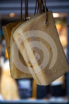 Hand made from natural ingredients and oils soap cutted from blocks hanging in shop close up