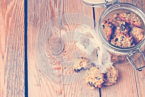 Hand made oatmeal cookies in a jar in a vintage style