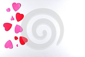 Hand-made pink love hearts and Gift box on white wooden texture background, Happy valentine`s day.