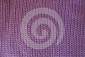 Hand made pink plain knit stitch fabric