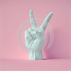 Hand made of plaster showing victory sign - pink background