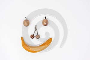 Wooden model fruit smiley face