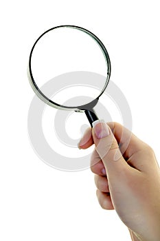 Hand with a magnifying glass