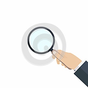 Hand with magnifying glass. Concept of searching, audit, analysis, exploration, scrutiny