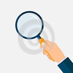 Hand with magnifying glass. Loupe in hand. Searching symbol. Vector EPS 10