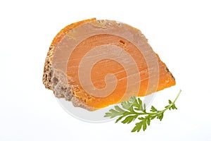 Hand maid farm mimolette slice cheese s on white