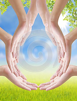 Hand make drop of water shape on nature background, concept design