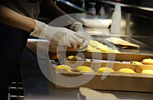 Hand making cheese tart close up