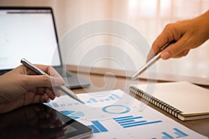 Hand man doing finances and calculate on desk about cost at home