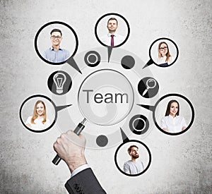 Hand of man forming a business team