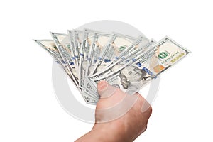 Hand of man holding fanned fistful dollars bills