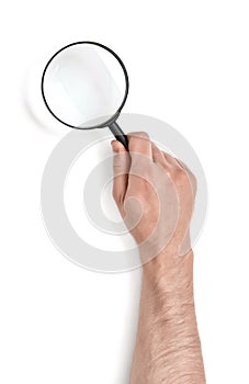 Hand of man holding the magnifying glass isolated on white background