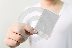 Hand of man holding photo frame, Clipping path included