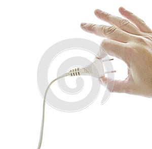 Hand of man showing a plug photo