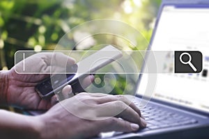 Hand man using laptop and Searching browsing data on the Internet online