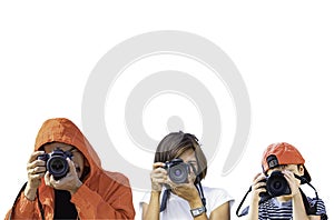 Hand man , woman and boy holding the camera Taking pictures on a white background