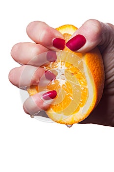 Hand with manicured nails painted a deep glossy red