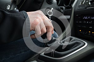 Hand on manual car shift. Slovakia