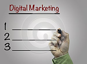 Hand with marker writing Digital Marketing, business concept