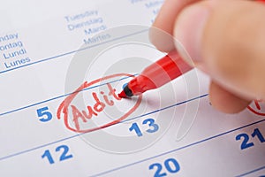Hand Marking Audit On Calendar