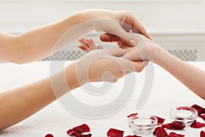 Hand massage closeup, acupressure photo