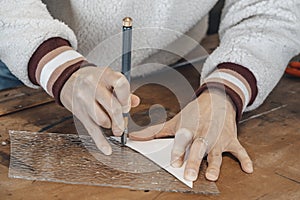 hand of master glassmaker at work in a workshop