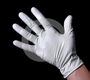 Hand in medical glove