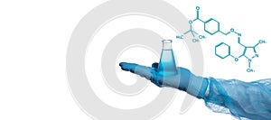 A hand in a medical glove holds a stake with blue liquid on a white background isolate, chemical formula, biotechnology research a