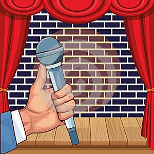 Hand with microphone stage wall brick stand up comedy show