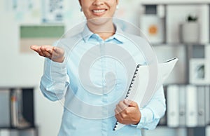 Hand, mockup and paperwork with a business woman holding paperwork and endorsing a product for marketing and advertising photo