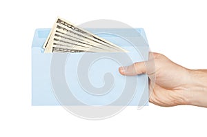 Hand and money in blue envelope