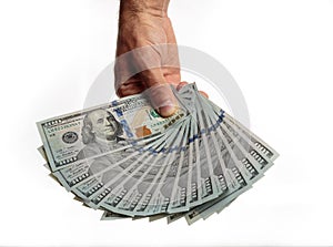 Hand with money isolated on a white background