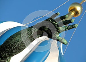A hand on the monument of Minin and Pozharsky in Red Square in Moscow, Russia