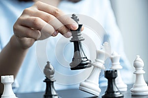 Hand move chess with strategy and tactic to win enemy, play battle on board game, business opportunity  competition strategic