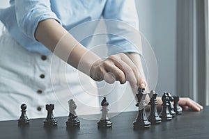 Hand move chess with strategy and tactic to win enemy, play battle on board game, business opportunity  competition strategic