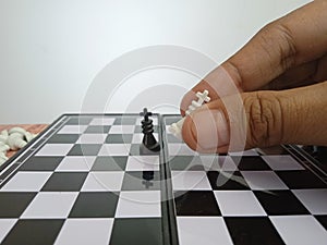 Hand Moving Chess, Illustration for photo War, battle, politic situation concept at gray background