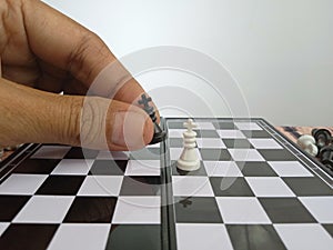 Hand Moving Chess, Illustration for photo War, battle, politic situation concept at gray background