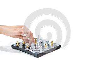 Hand moving small chess on white background.